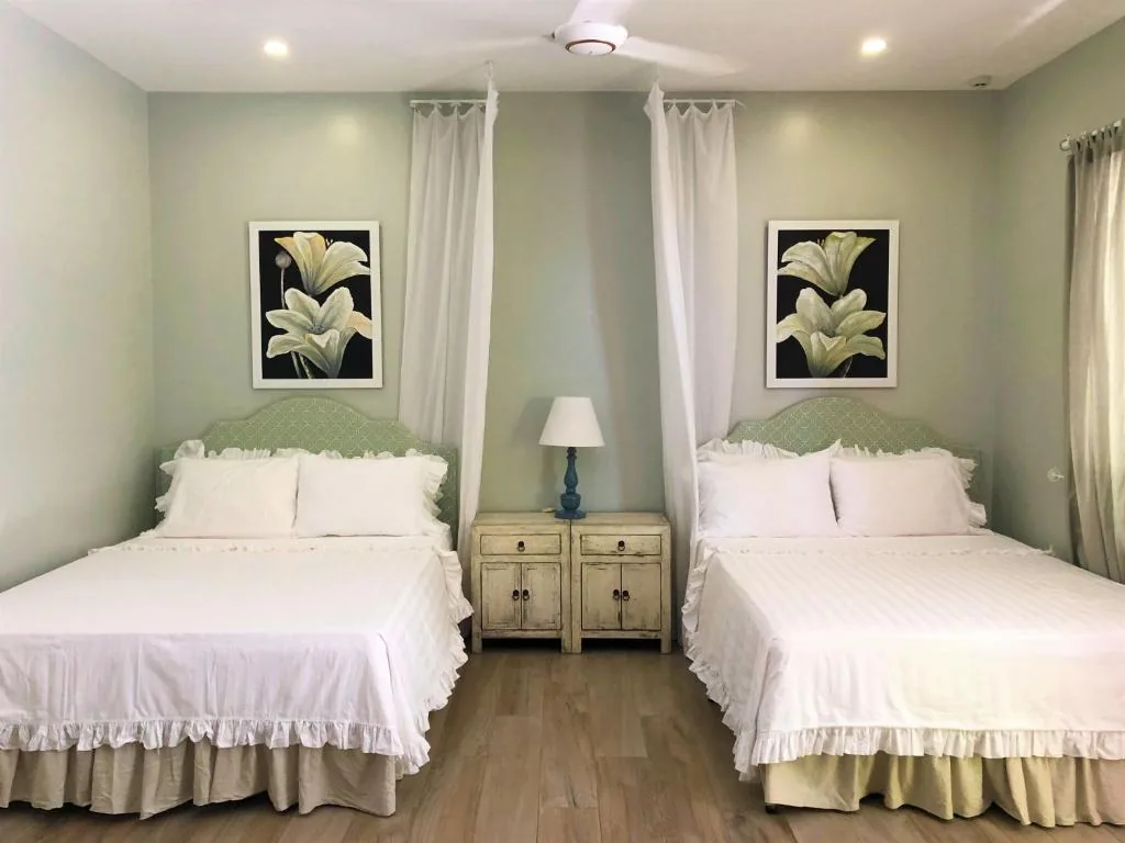 Quadruple Room with Garden View — Serenity by the Sea
