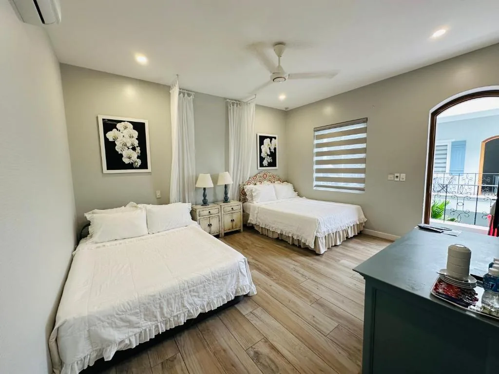 Quadruple Room with Terrace — Serenity by the Sea